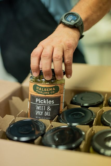 Packing finished jars into a shipping box